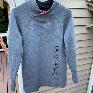 CK performance wear. Cozy, past hip-length sweater